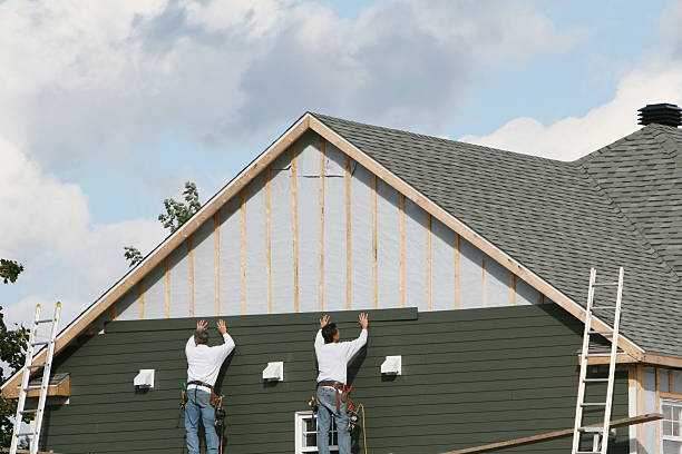 Professional Siding Installation technician working in Tobaccoville, NC